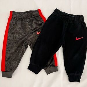 Nike Kids' Black and Charcoal Joggers with Red Accents
